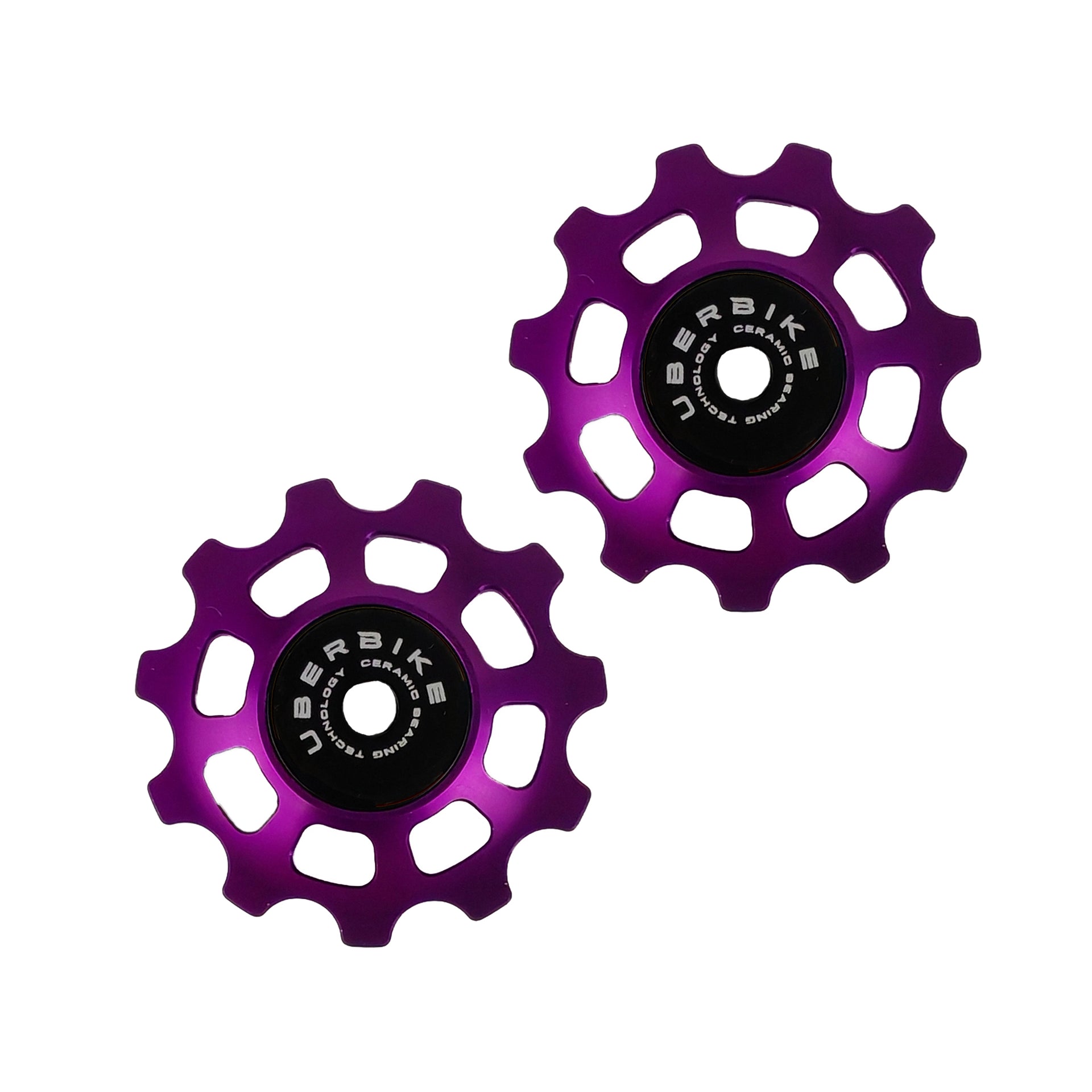 two purple ceramic 11 tooth jockey wheels on a white background