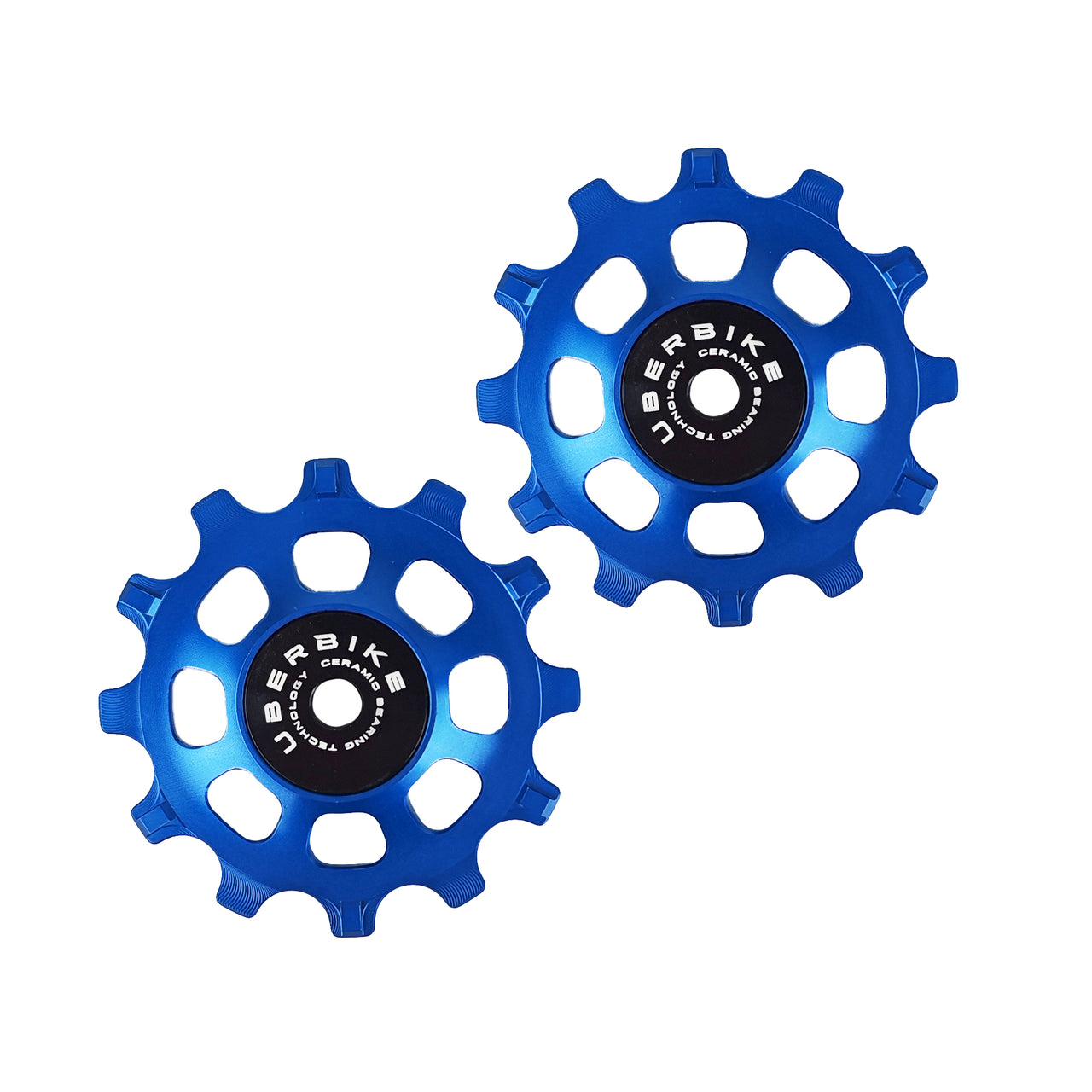 two blue ceramic 12 tooth jockey wheels on a white background