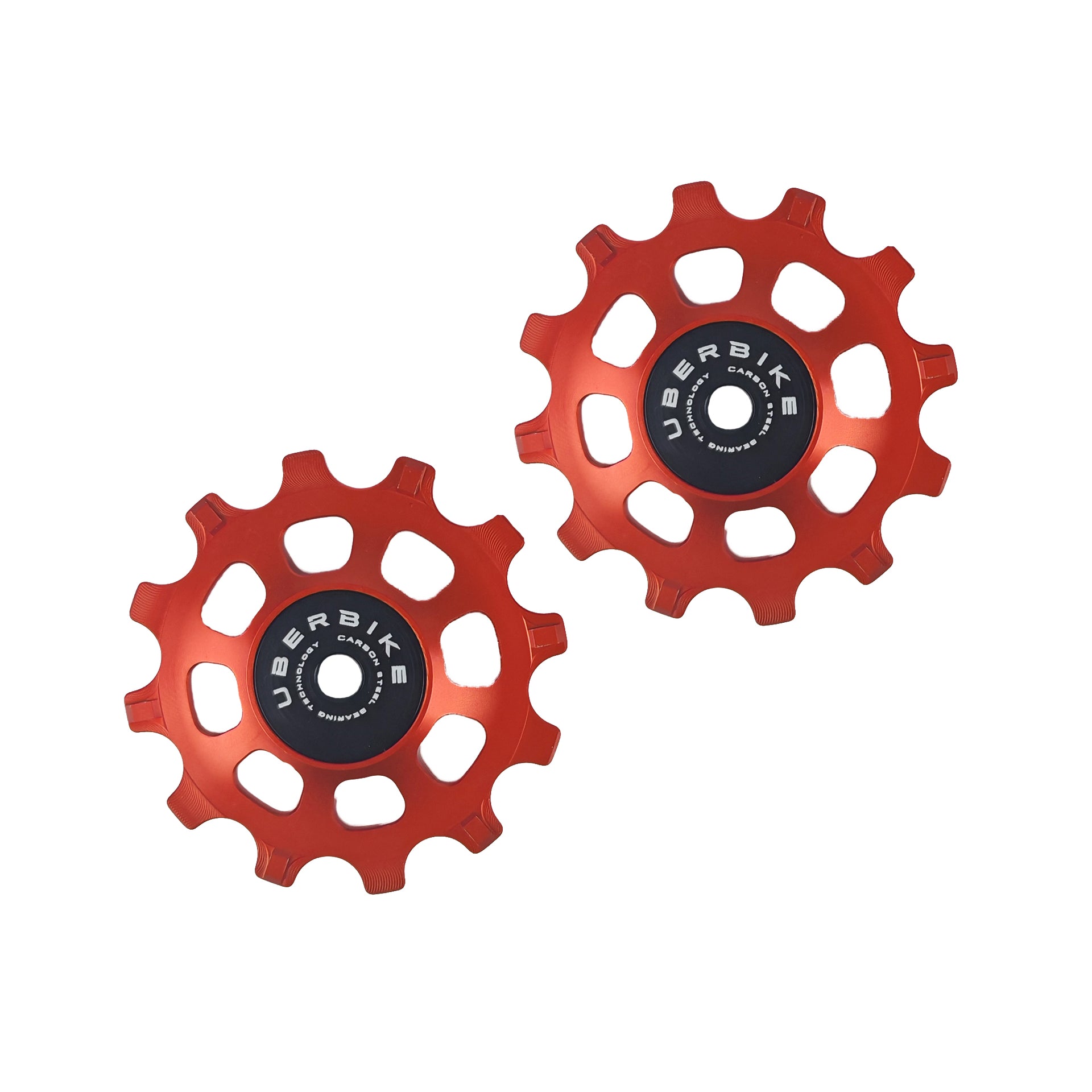 two orange steel 12 tooth jockey wheels on a white background