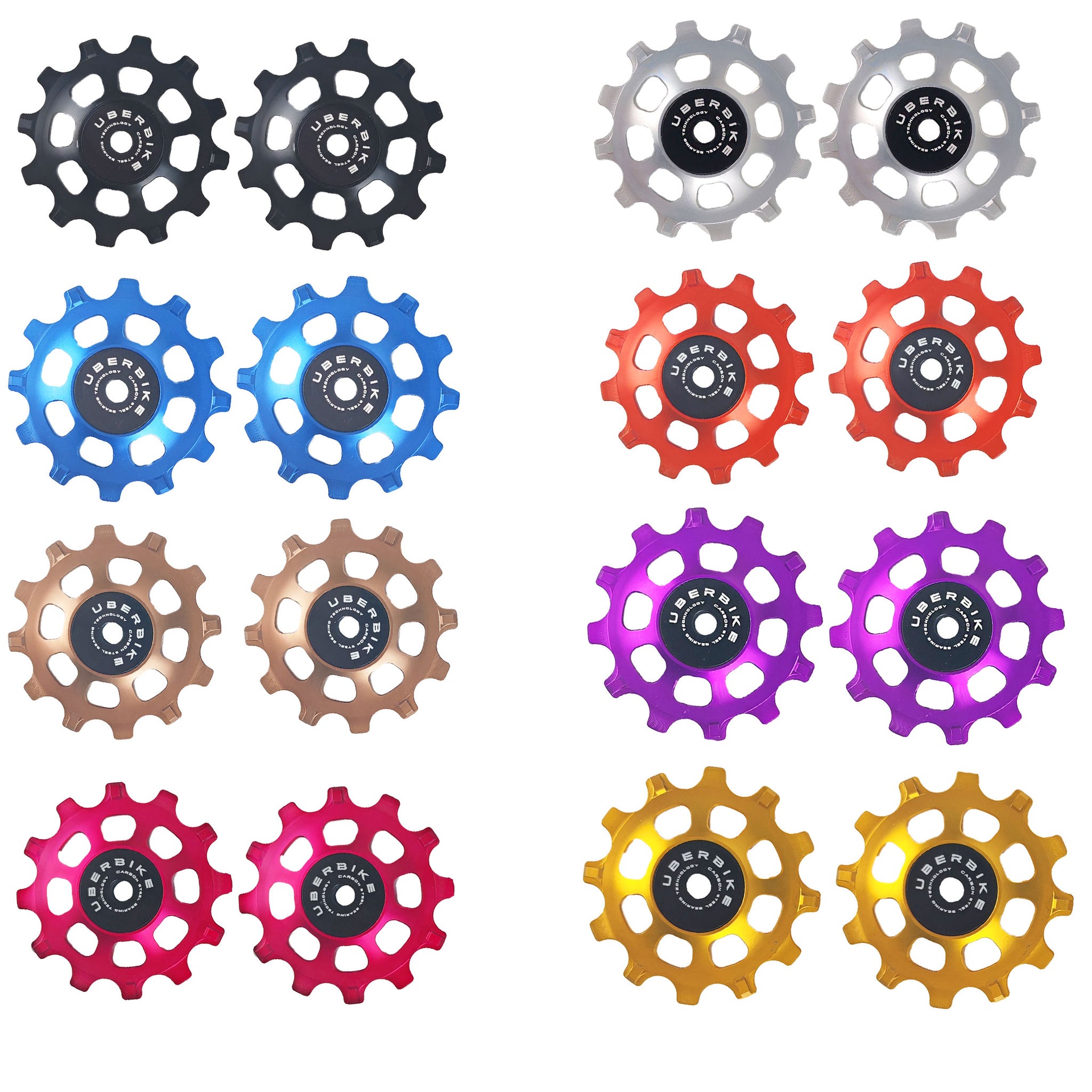 8 different coloured 12 tooth jockey wheels with steel bearings with Uberbike branding on a white background