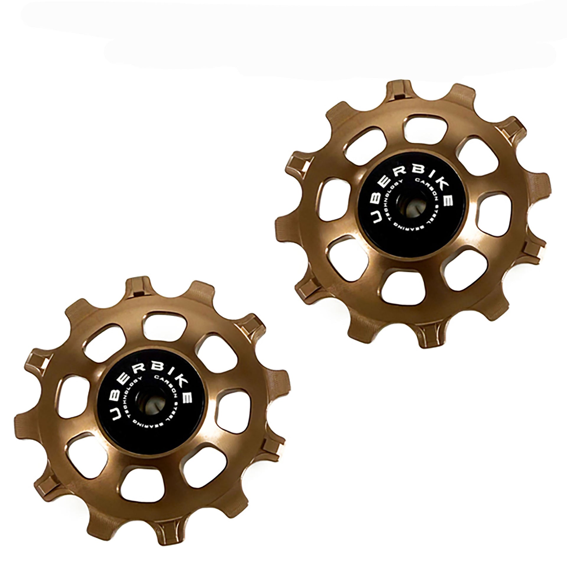 Two steel Bronze jockey wheels with Uberbike branding with 12 teeth on a white background