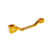 a gold post mount to post mount disc brake adapter for 160mm-180mm disc brake rotor on a white background