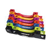 7 different colour post mount disc brake adapter for 160mm to 203mm disc brake rotors on a white background