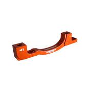 an orange post mount to post mount disc brake adapter for 160mm-203mm disc brake rotor on a white background