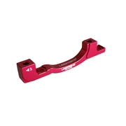 a red post mount to post mount disc brake adapter for 160mm-203mm disc brake rotor on a white background