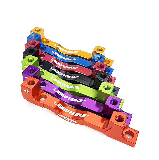 7 variously colour post mount adapters from size 180mm to 220mm with Uberbike branding on a white background