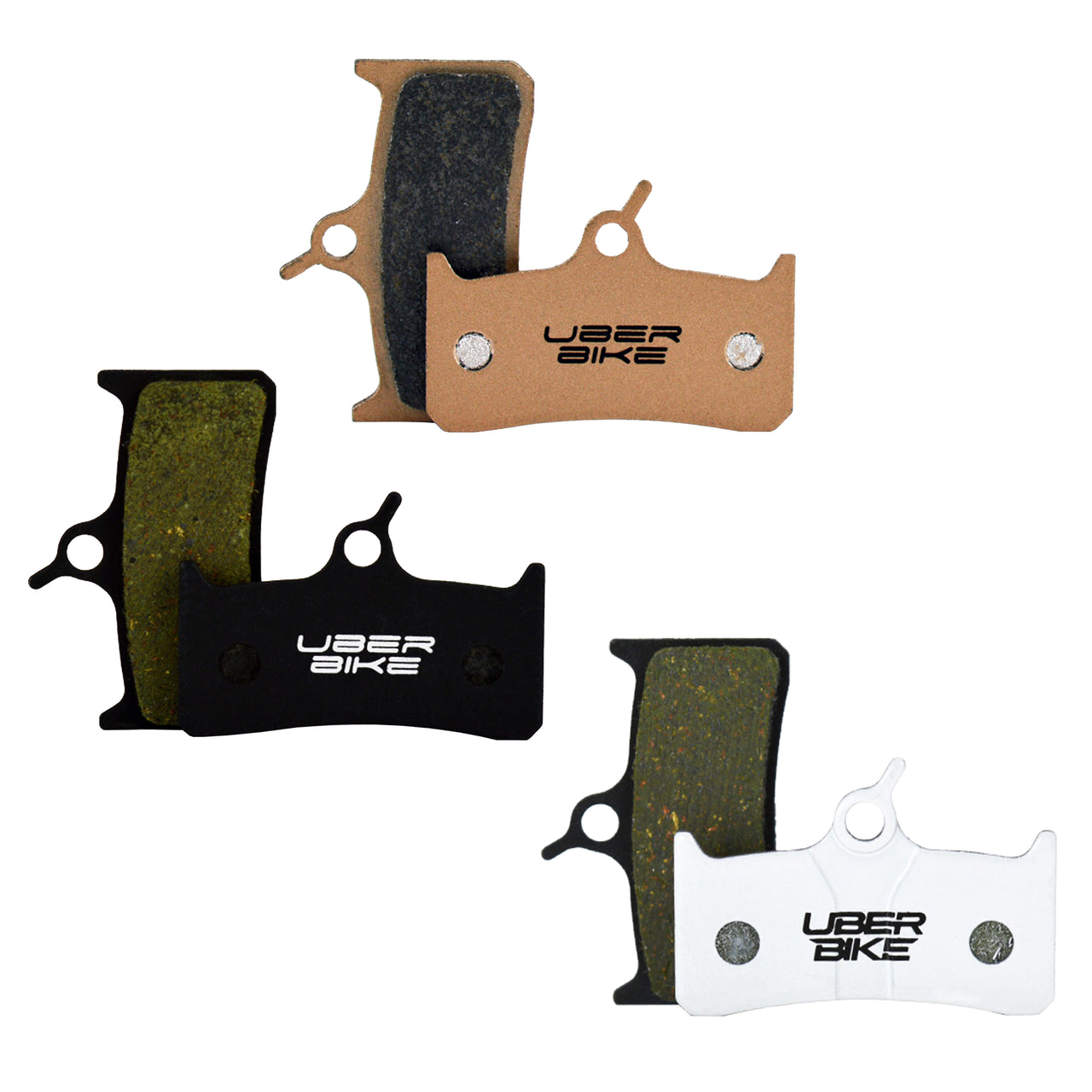 3 sets of Uberbike brake pads on a white background.