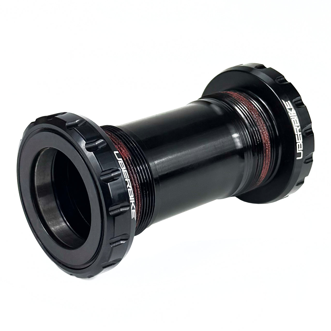 black BSA 30mm ceramic bottom bracket with Uberbike branding on a white background