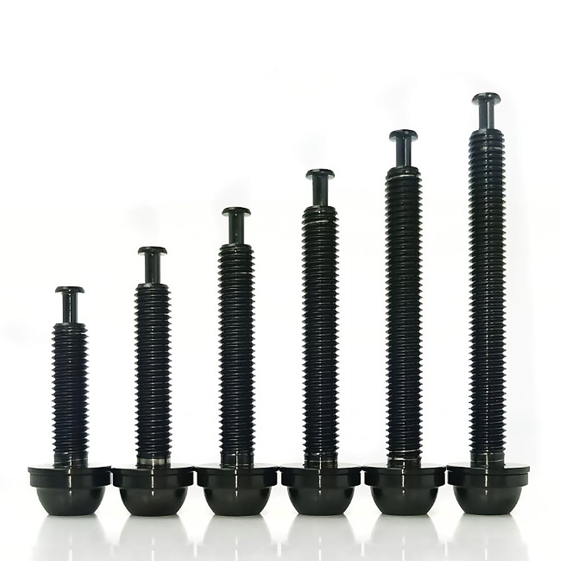 different sized black flat mount bolts in on a white background