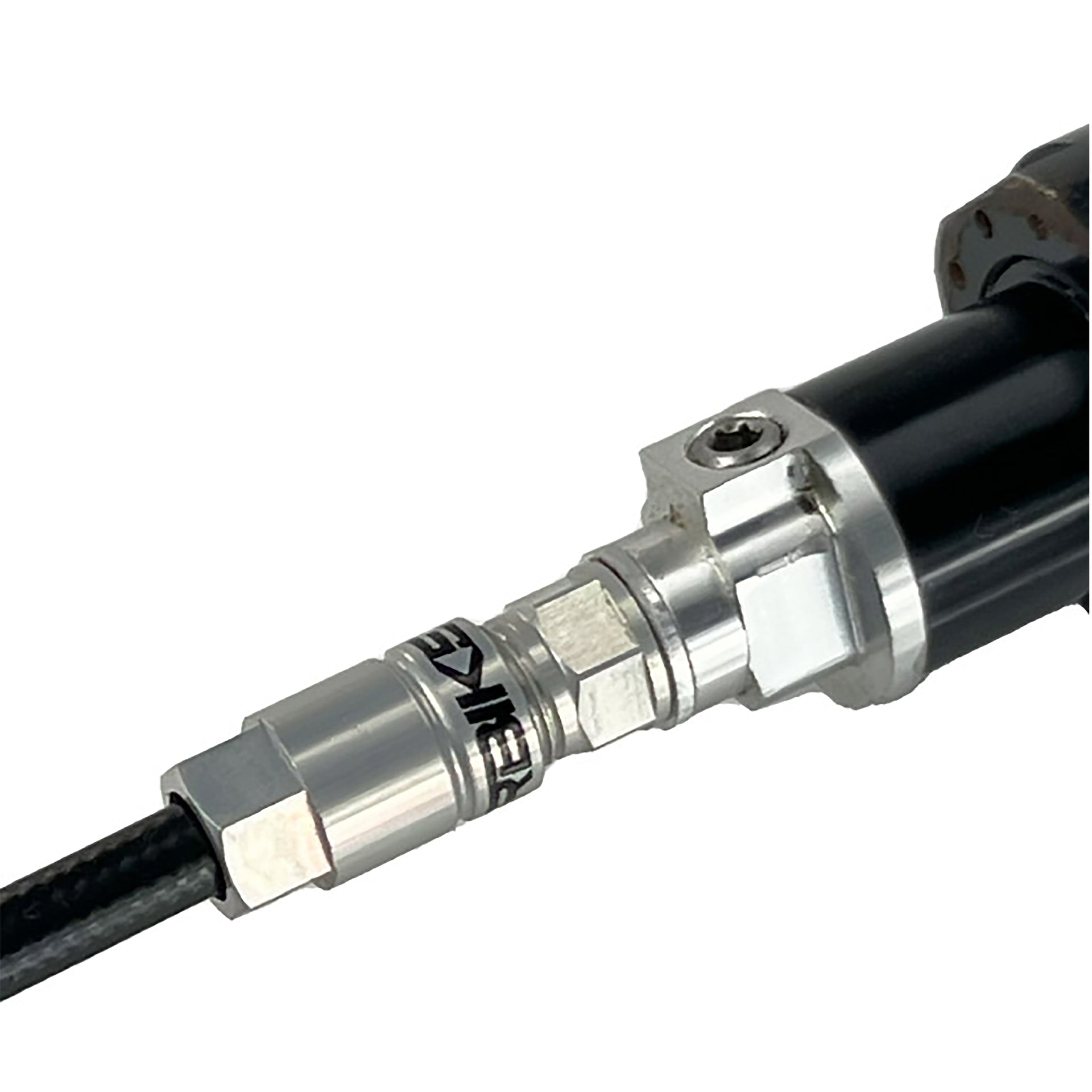 Black reverb hose installed in a dropper post on a white background