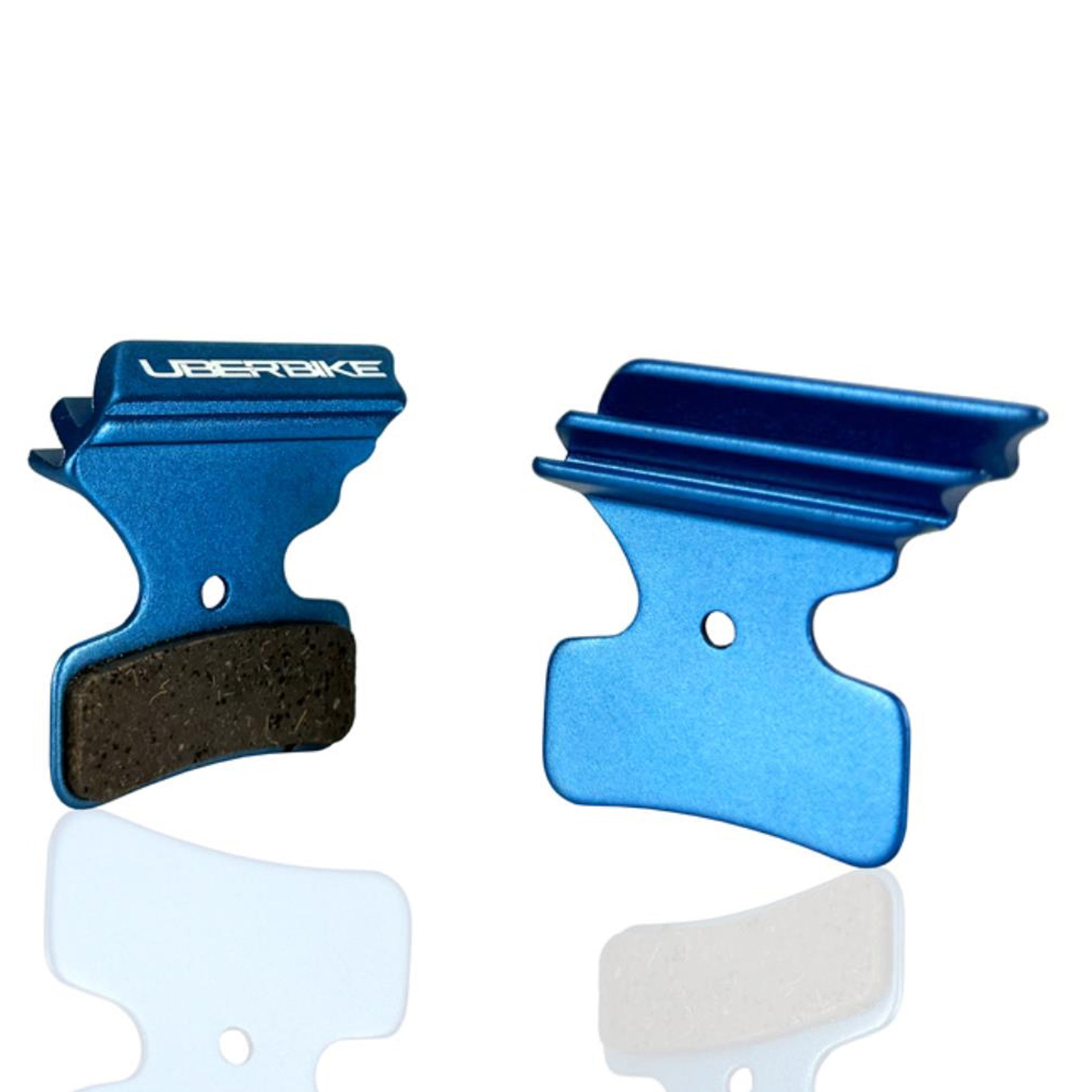 Blue Shimano Polar Tech disc brake pads with Uberbike branding on a white background