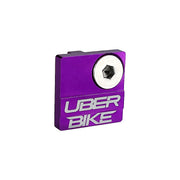 a direct mount front derailleur cover in purple on a white background