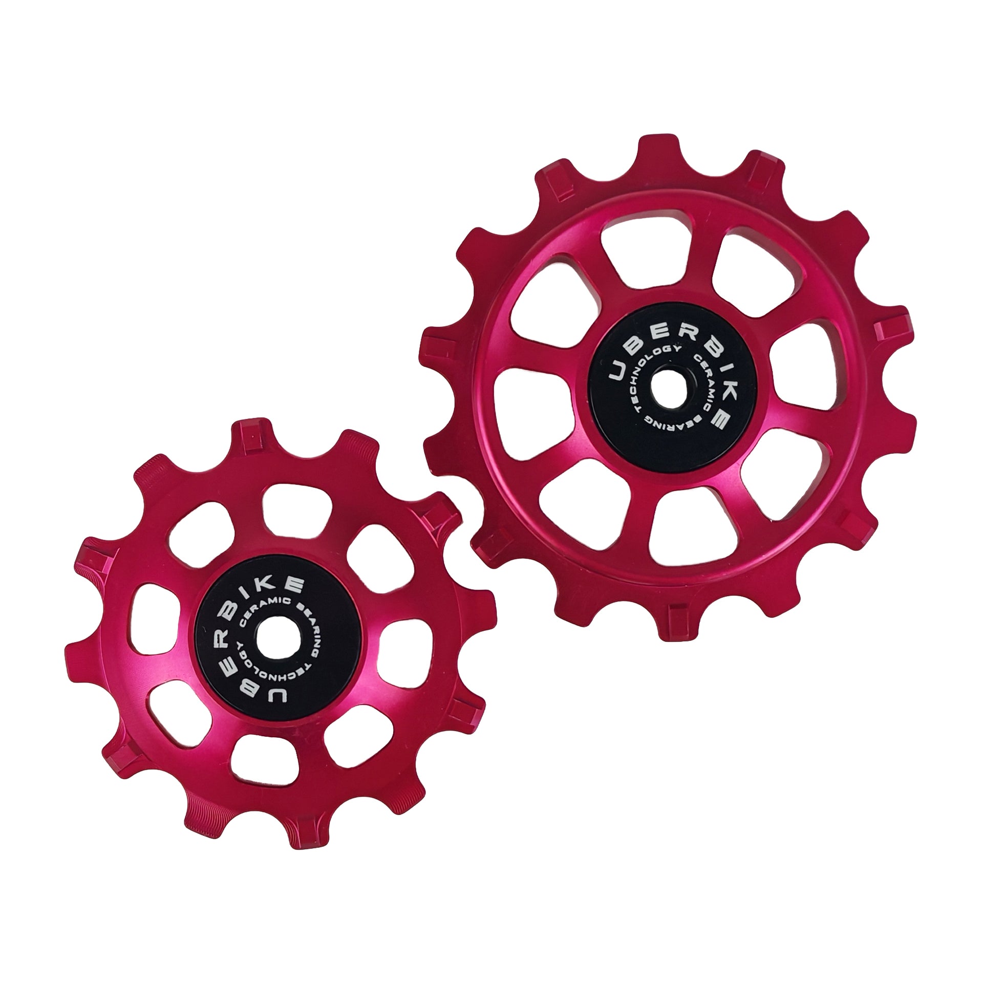 one ceramic red 12 tooth and one 14 tooth jockey wheel on a white background