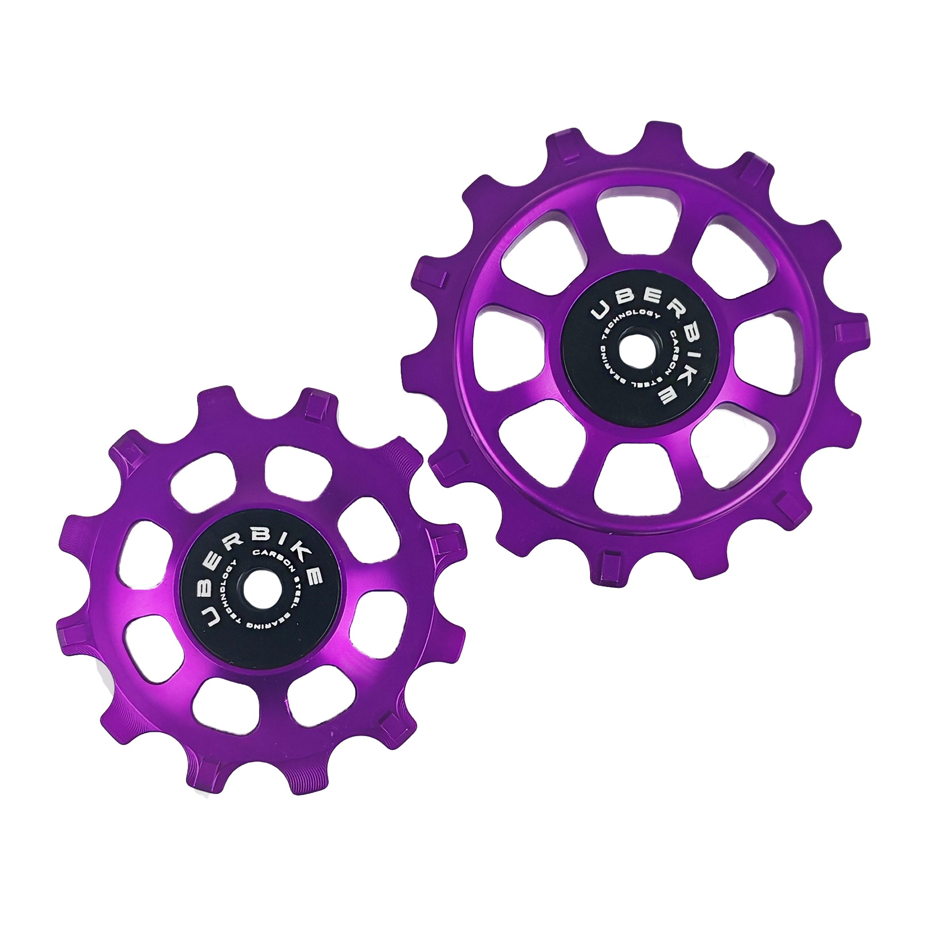 one purple steel 12 tooth and one 14 tooth jockey wheel on a white background