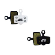 Brake pads with Uberbike branding on a white background.