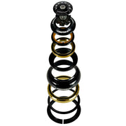 a stack of components for an external cup headset with Uberbike branding on a white background