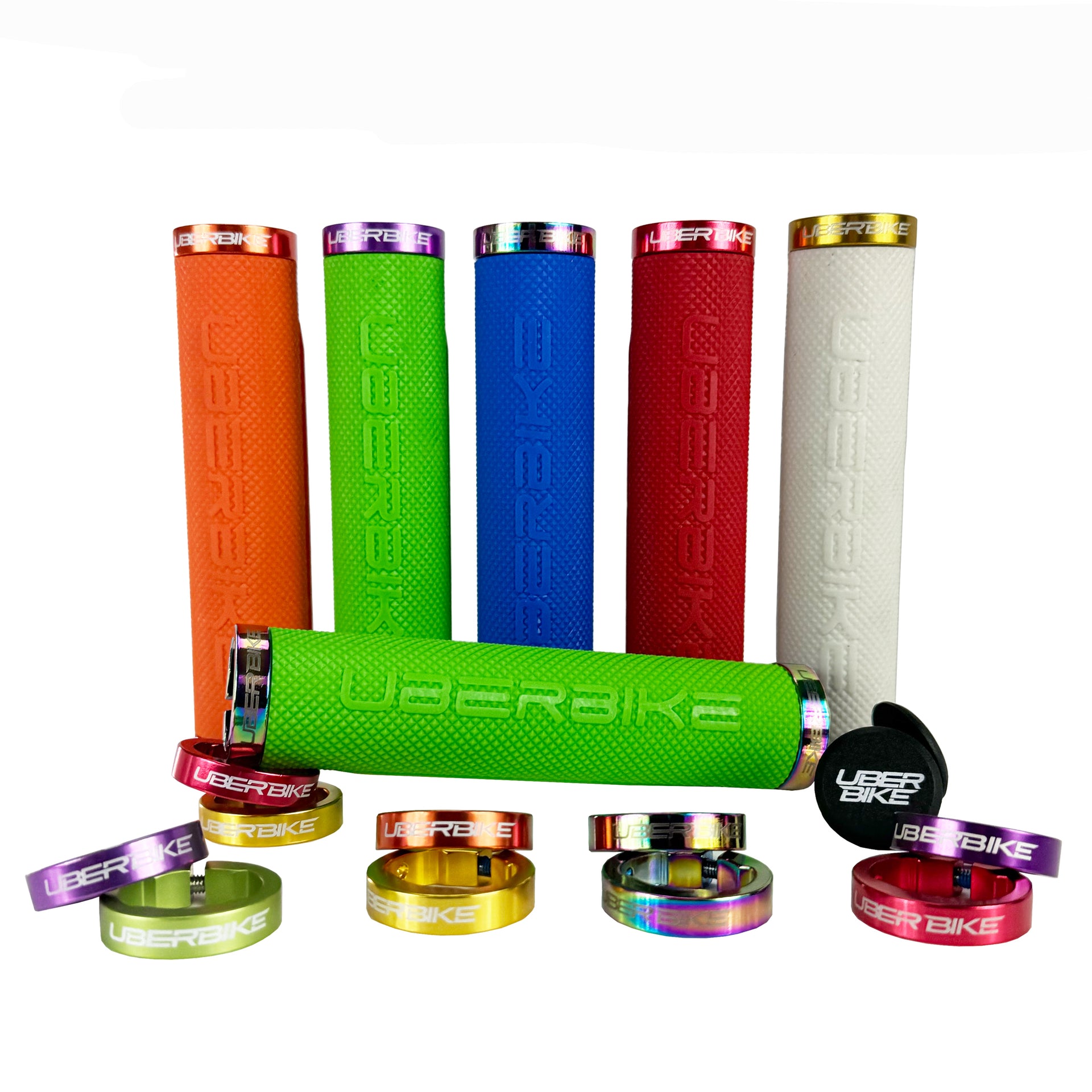 Uberbike branded bicycle handlebar grips with colour lockrings on a white background