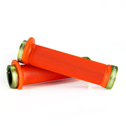 Mountain bike orange flange grip with green lock rings on a white background