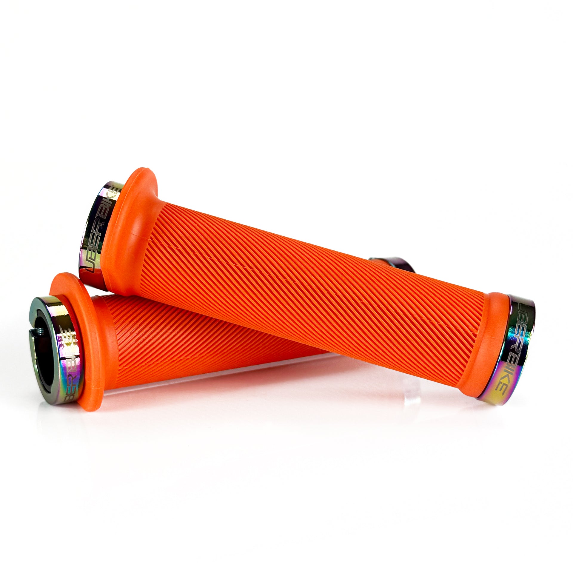 Mountain bike orange flange grip with oil slick lock rings on a white background