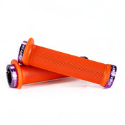 orange flange mountain bike grips with purple lock rings with Uberbike branding on a white background