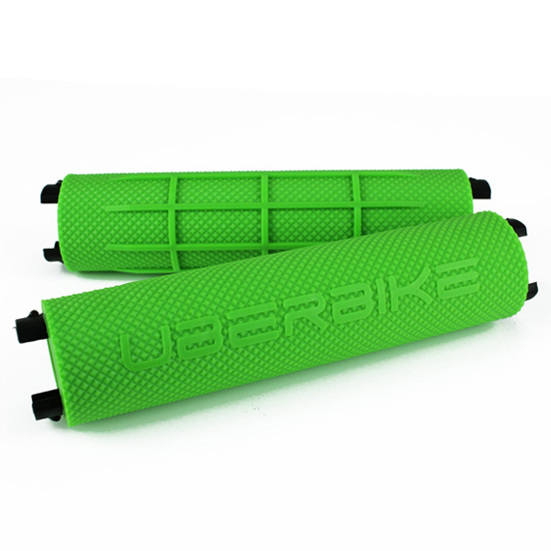 two green fatgrips with Uberbike branding on a white background