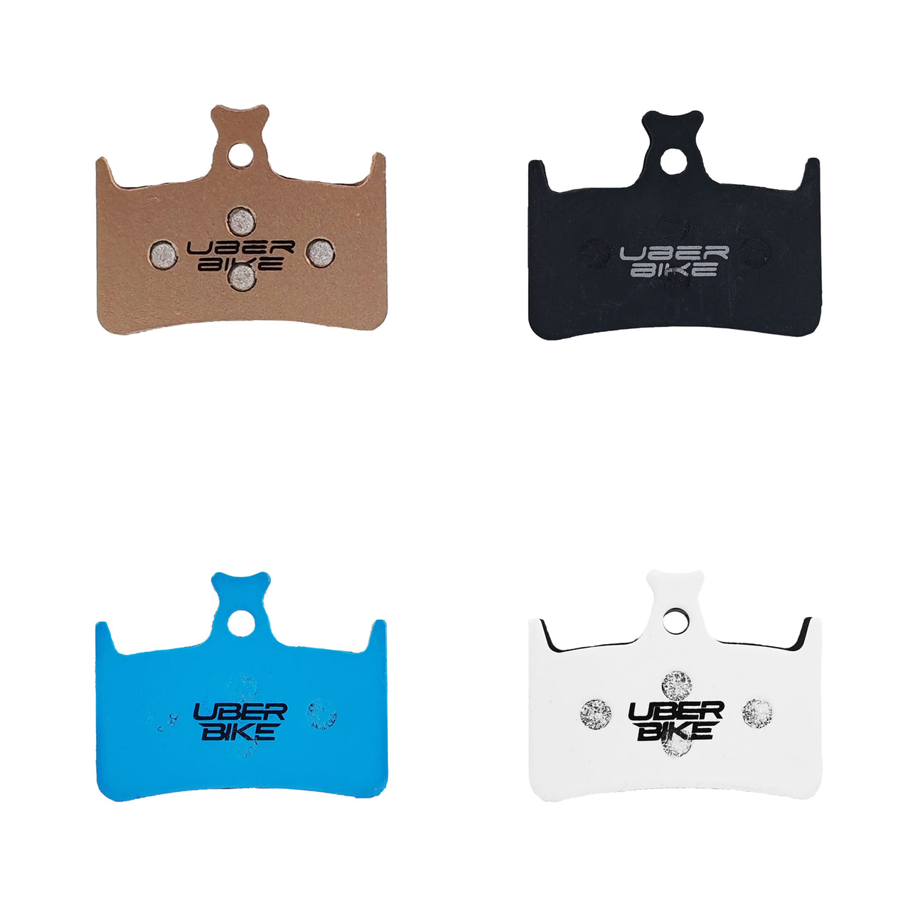 Bronze, black, blue and white hope brake pads on a white background