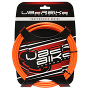 orange hydraulic brake hose kit with Uberbike branded packaging on a white background