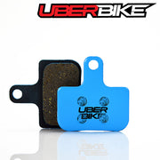 Uberbike E-Matrix MTB/ebike brake pads with Uberbike branding on a white background.