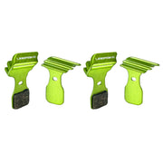 green finned 4 piece magura MT5 disc brake pads on a white background