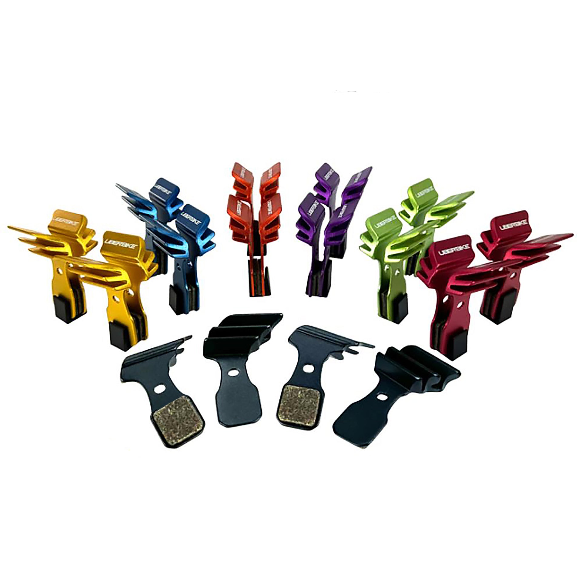 7 different coloured finned magura MT5 4 piece disc brake pads on a white background