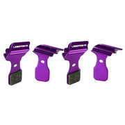 purple finned 4 piece magura MT5 disc brake pads on a white background