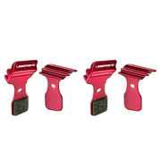 red finned 4 piece magura MT5 disc brake pads on a white background