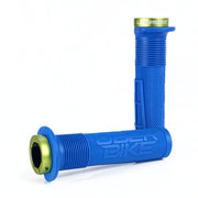 two blue mushroom waffle mountain  bike grips and green lockrings on a white background