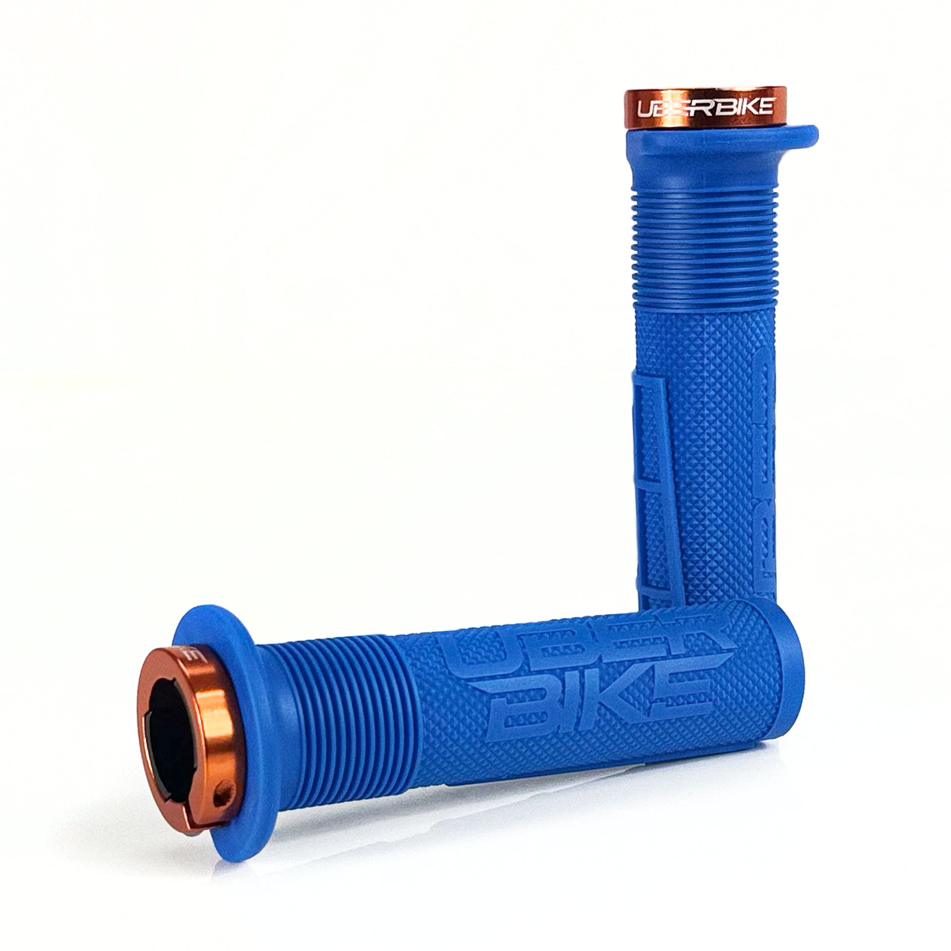 two blue mushroom waffle mountain  bike grips and orange lockrings on a white background