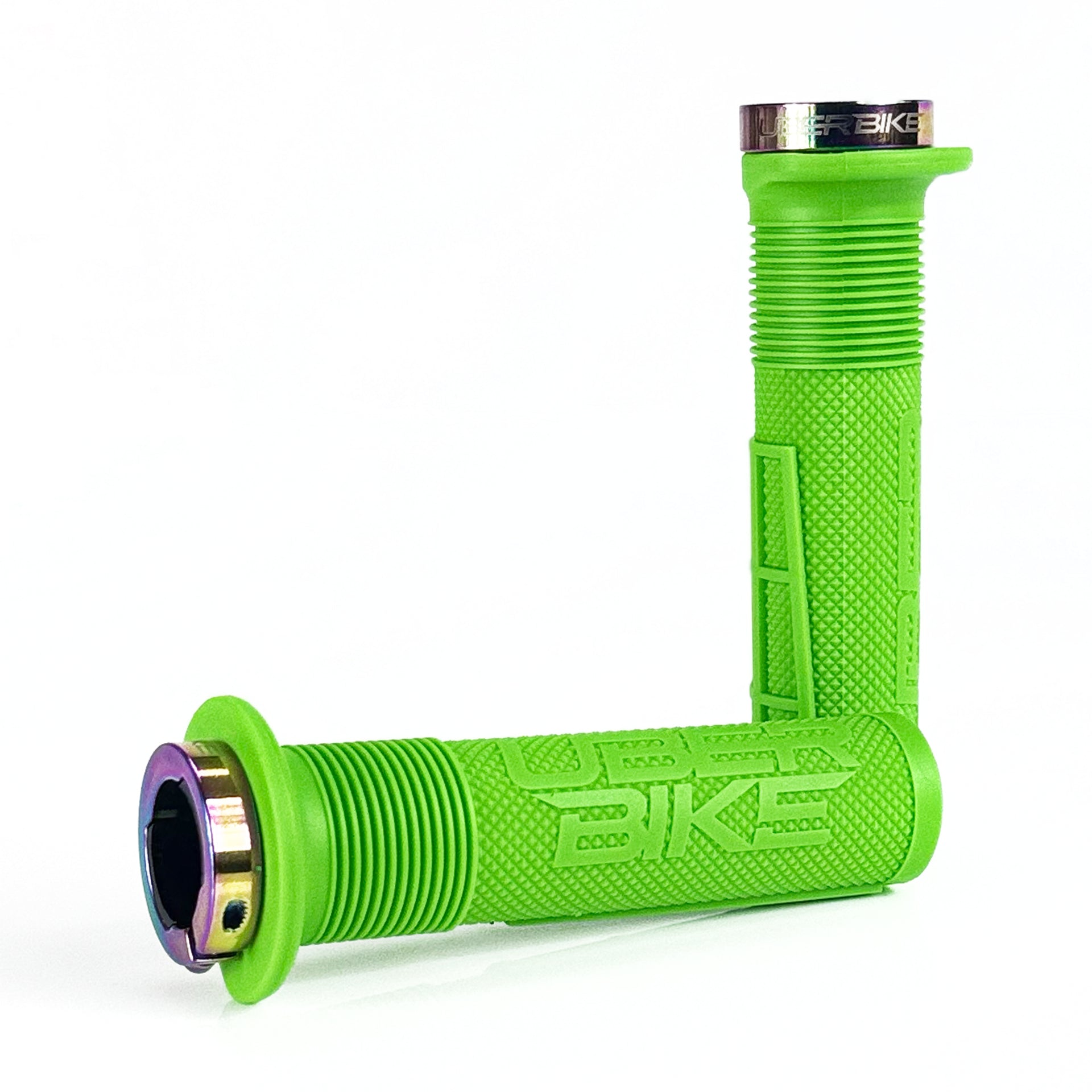 two green mushroom waffle mountain  bike grips and oil slick lockrings on a white background