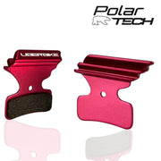 Red brake pads with Uberbike branding on a white background, featuring Polar Tech logo.