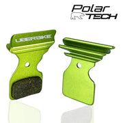 Green brake pads with Uberbike branding on a white background, featuring the Polar Tech logo.