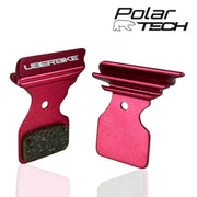 Red brake pads with Uberbike branding on a white background, featuring Polar Tech logo.