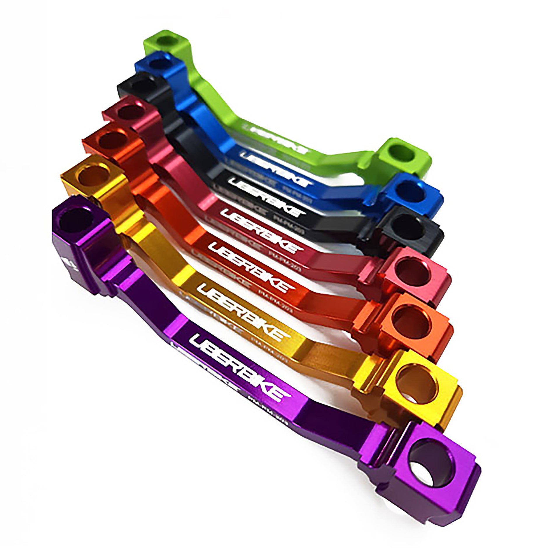 7 differently coloured post mount adapters for 160mm - 180mm on a white background