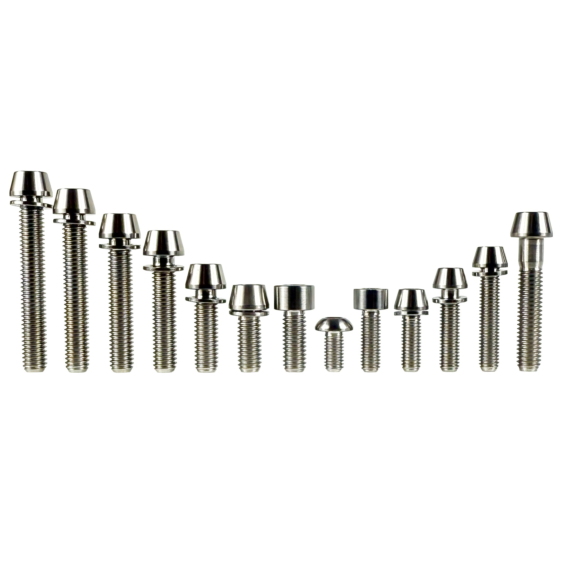 Various sized raw silver titanium bolts on a white background