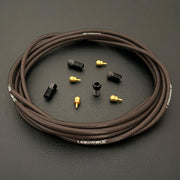 SRAM Code Stealth Bronze hydraulic smoke braid stainless brake hose kit with straight connector stealthmajig fittings and Uberbike branding on a black background