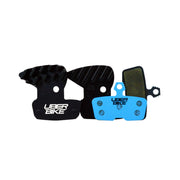 sram code stealth bronze finned e-matrix brake pads with Uberbike branding on a white background
