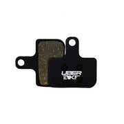 SRAM Level Stealth semi metallic brake pads with Uberbike branding on a white background