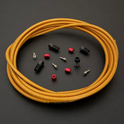SRAM Maven Bronze hydraulic gold braid kevlar brake hose kit with straight connector stealthmajig fittings and Uberbike branding on a black background