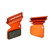 orange finned SRAM Red 22 B1 HRD brake pads on a white background