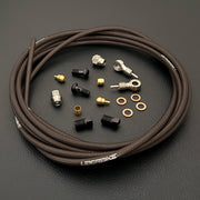 SRAM XX hydraulic smoke braid stainless brake hose kit with silver banjo fittings and Uberbike branding on a black background