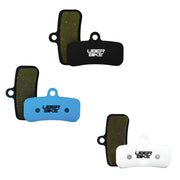 3 sets of Uberbike brake pads on a white background.