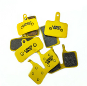 Uberbike brake pads on a white background.