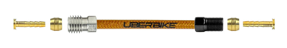 Shigura hydraulic kevlar braid brake hose fittings using a straight connector with Uberbike branding on a white background