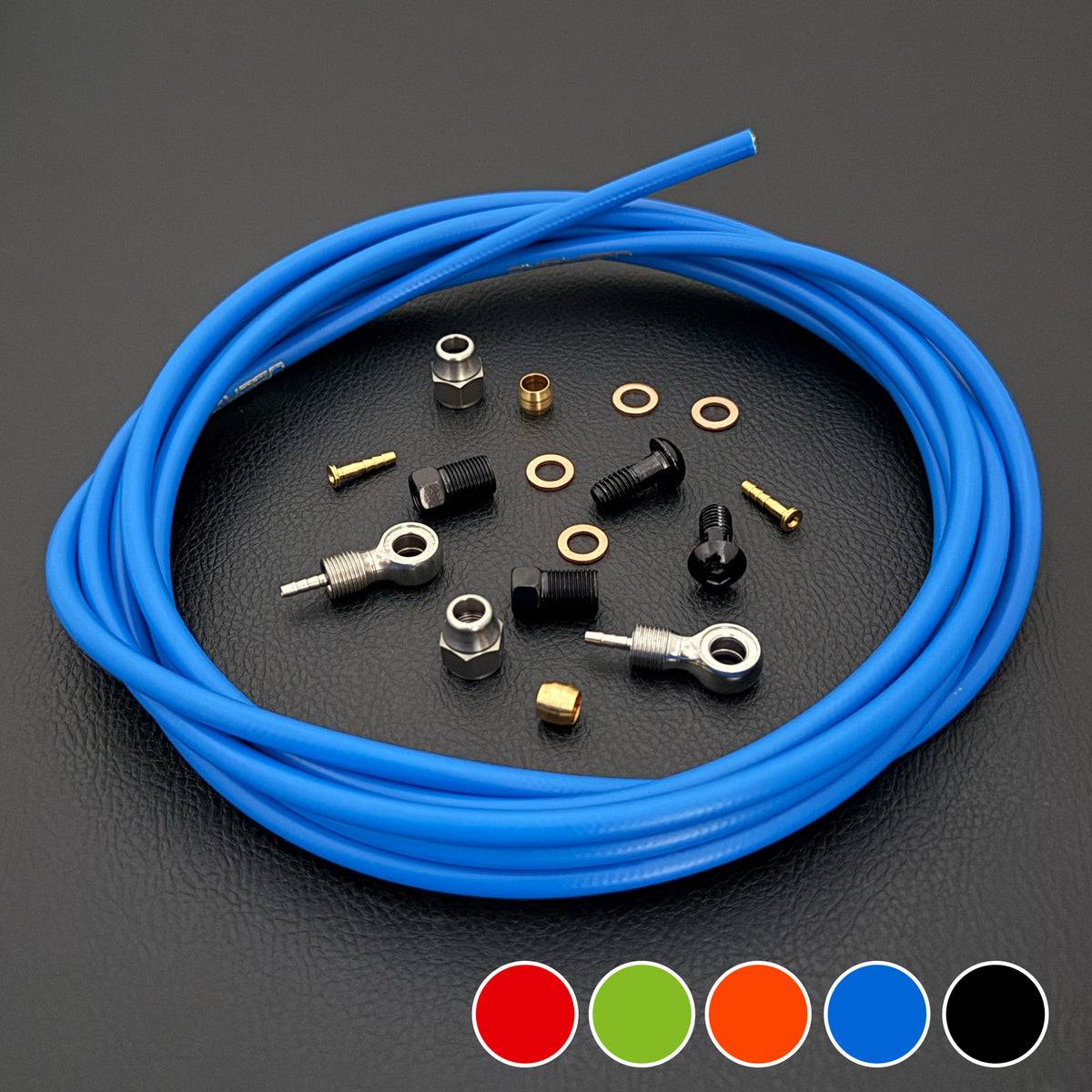 Shimano Deore XT hydraulic brake hose kit with banjo fittings on a black background with a colour sample in the bottom right hand corner